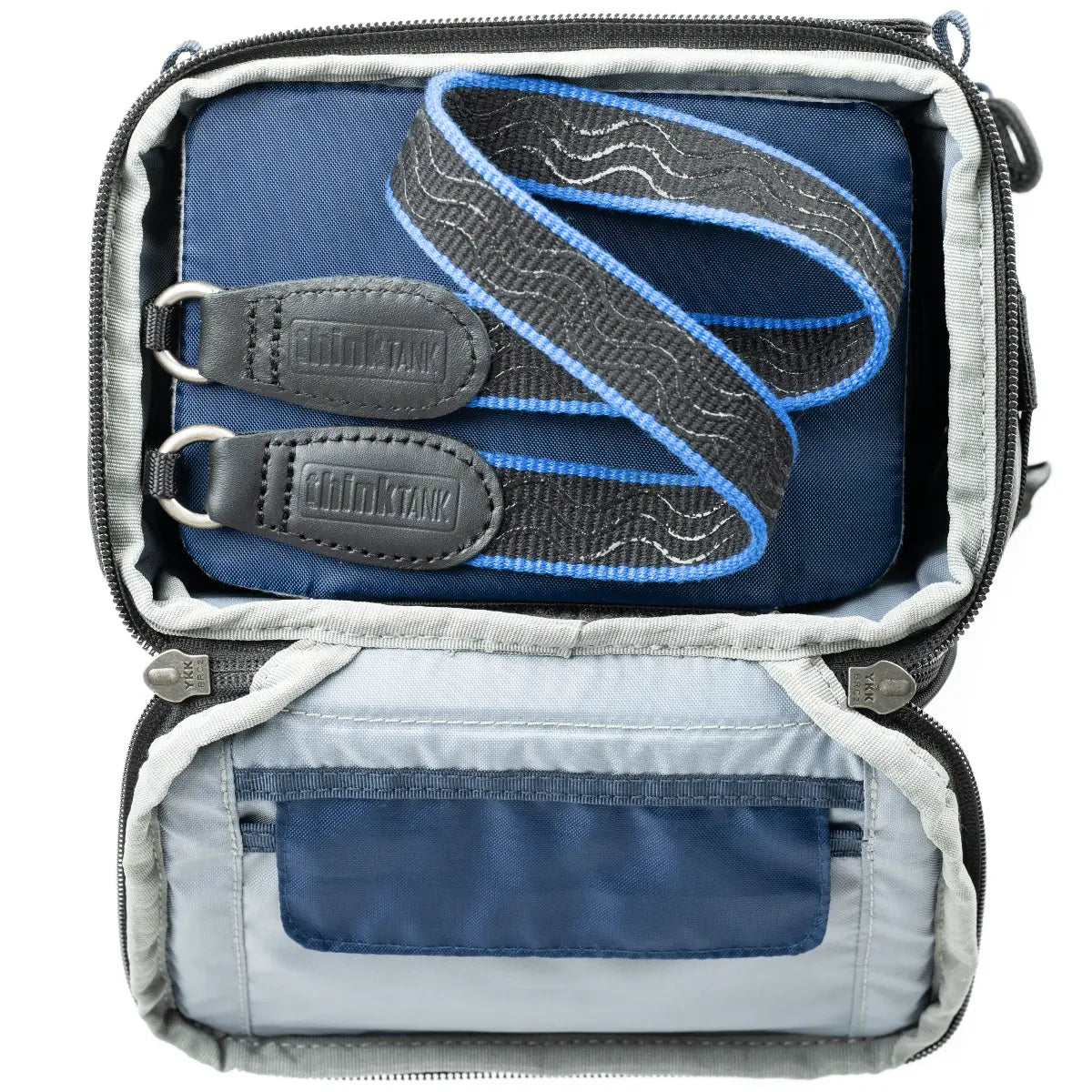 Camera bag with straps and Think Tank logo on a white background