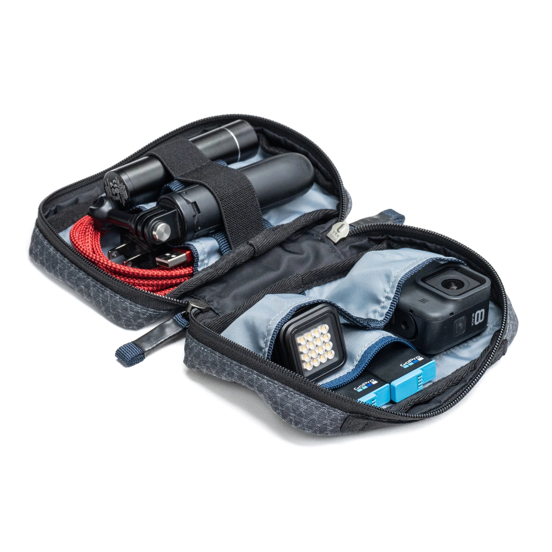 ThinkTank EDC Tech Pouch 10 side angle with accessories in