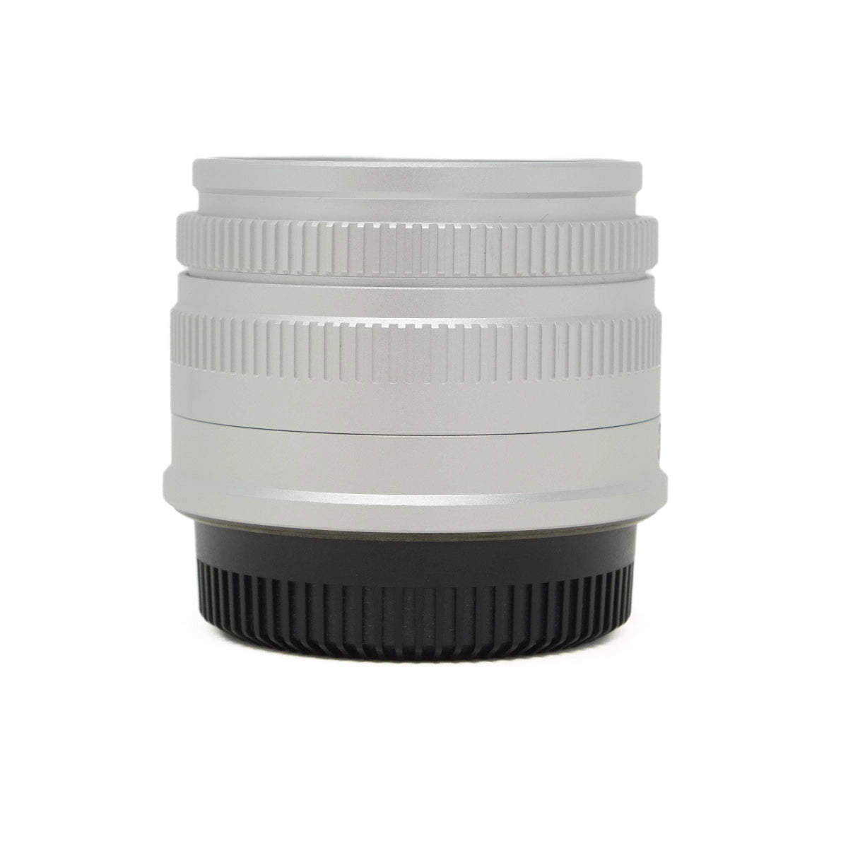 White camera lens with black base on a white background