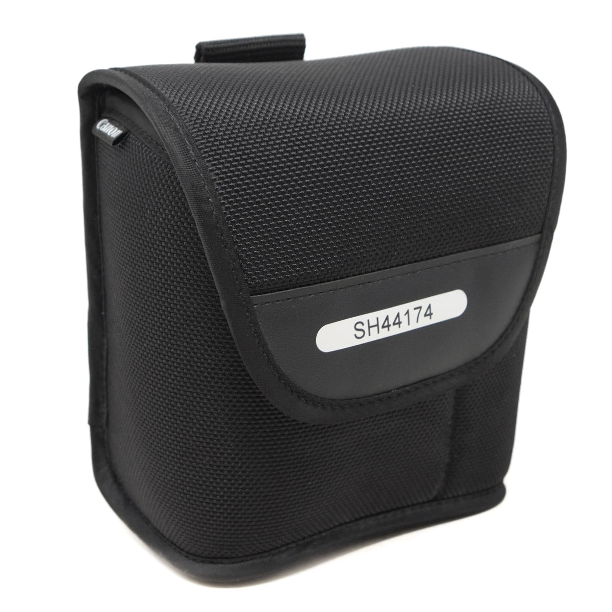 Black carrying case with a label on a white background