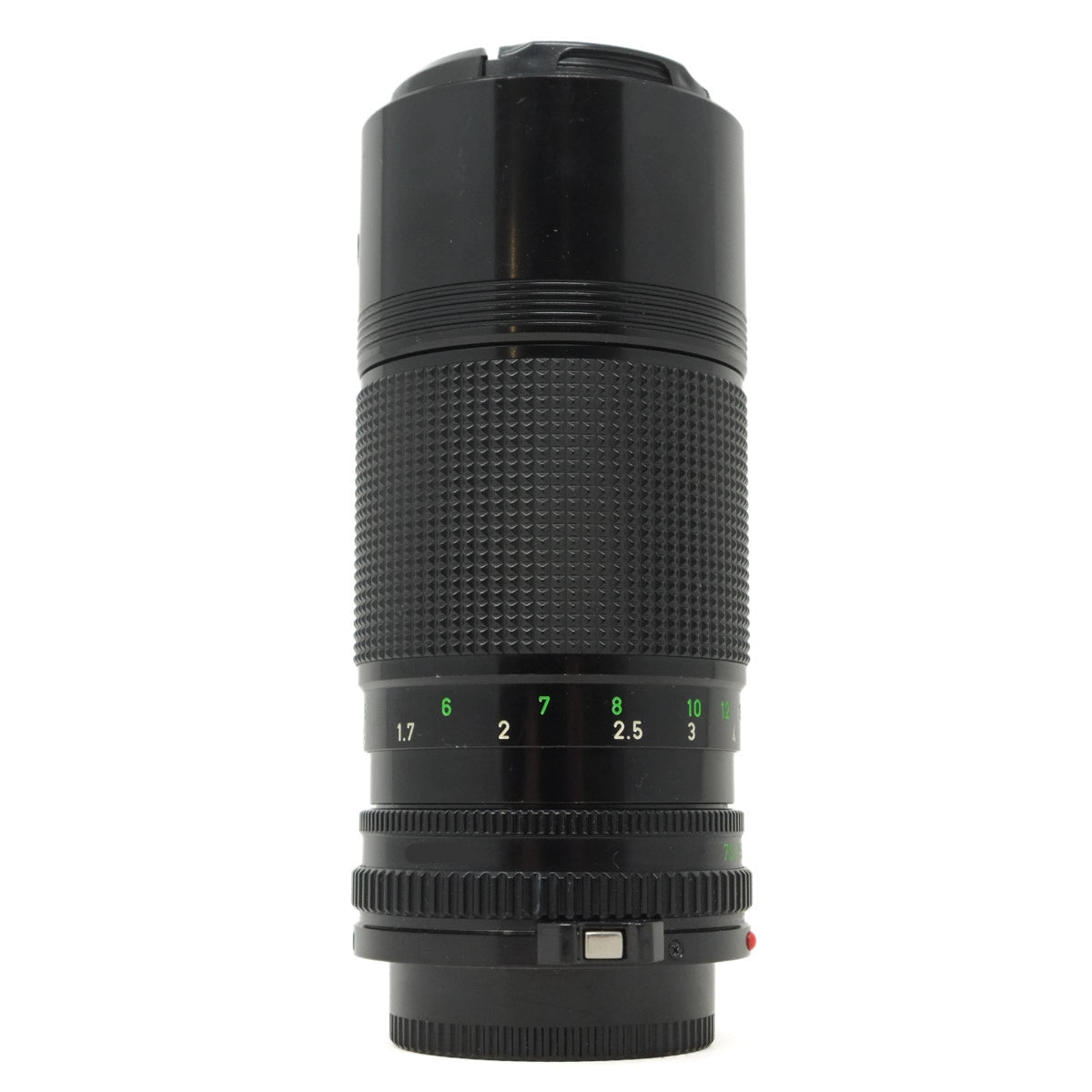 Black camera lens with focus scale on a white background