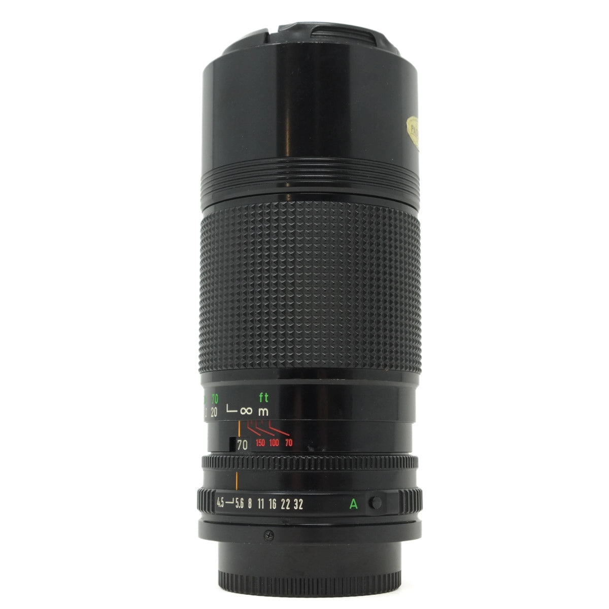 Black camera lens on a white background