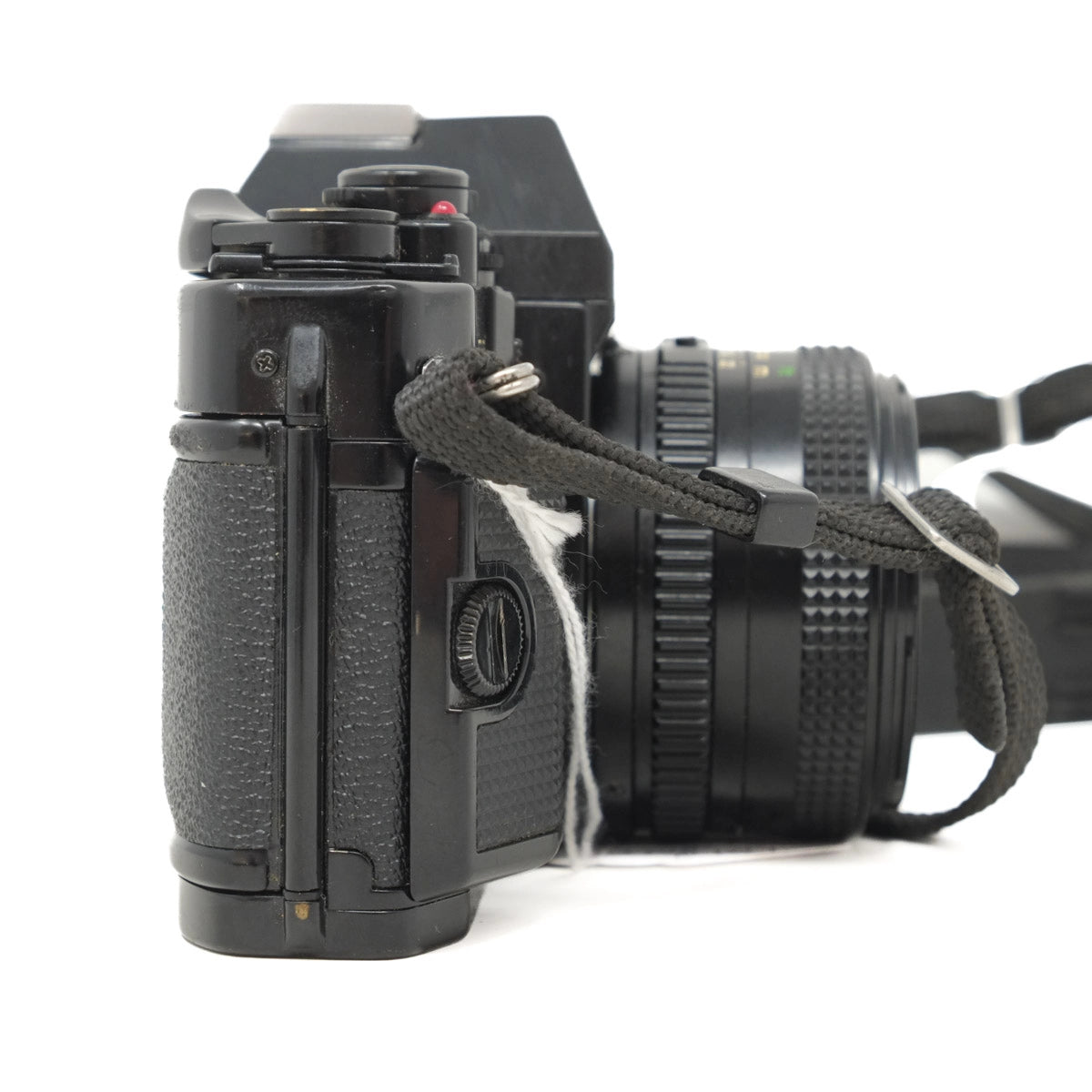 Used Canon A-1 Classic film camera with 50mm f1.8 and instructions - side angle