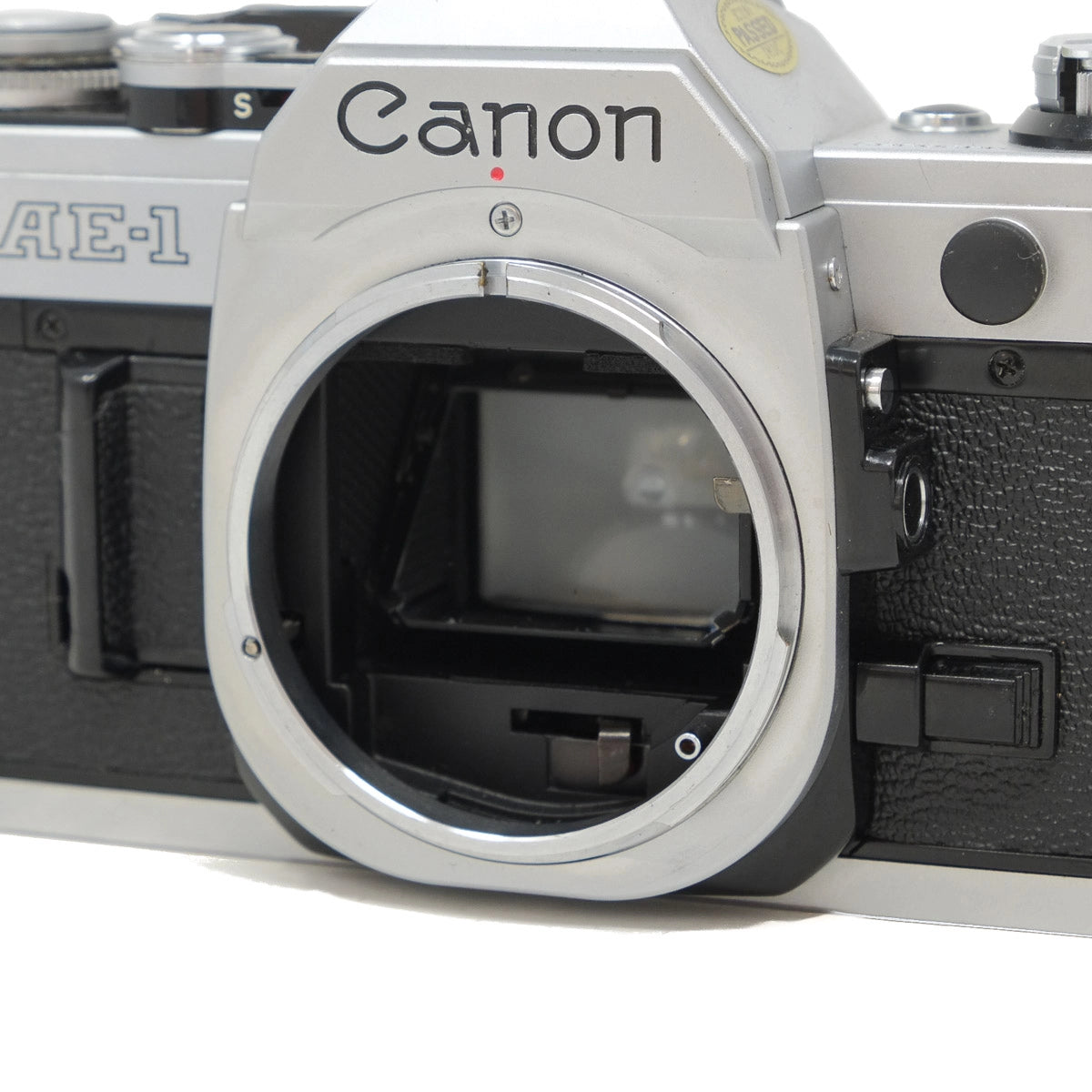 Canon camera with a close-up of the lens mount on a white background