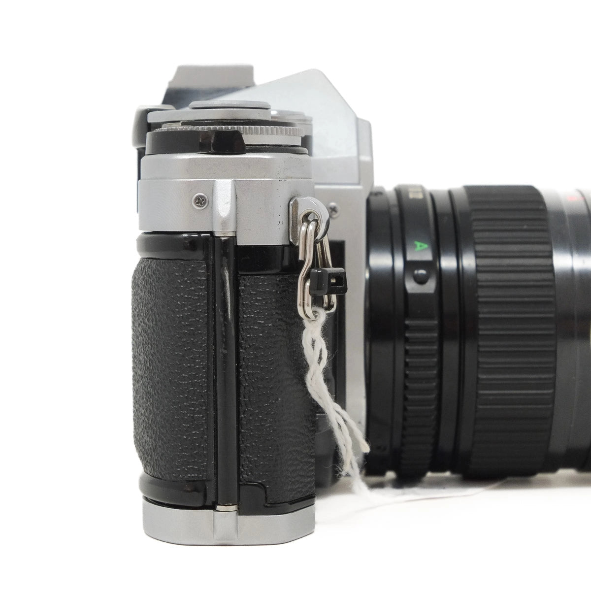 Vintage camera with a lens on a white background
