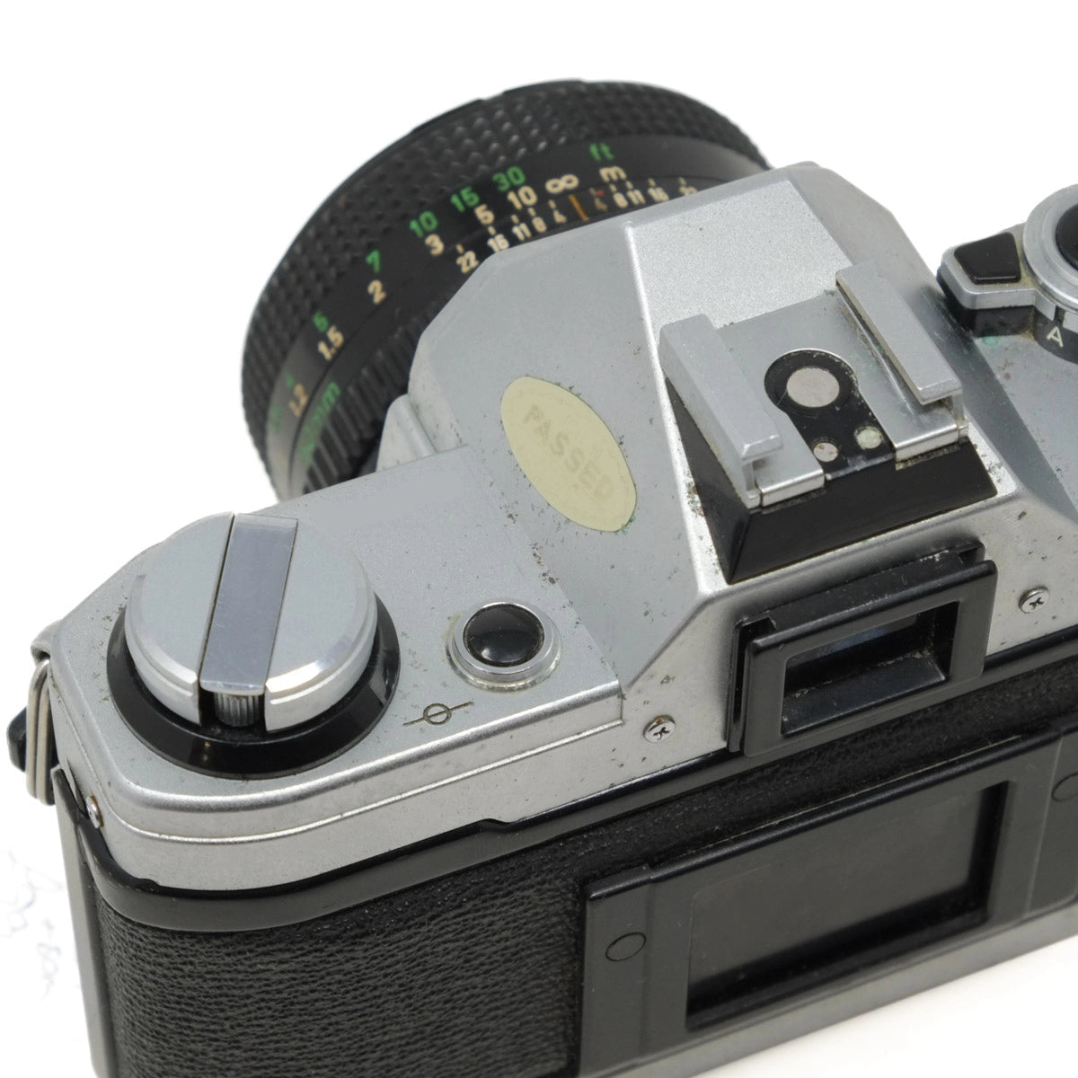 Close-up of a vintage camera on a white background
