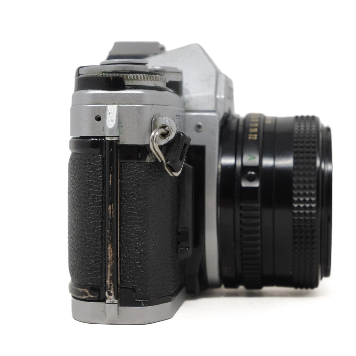 Vintage camera with lens on a white background