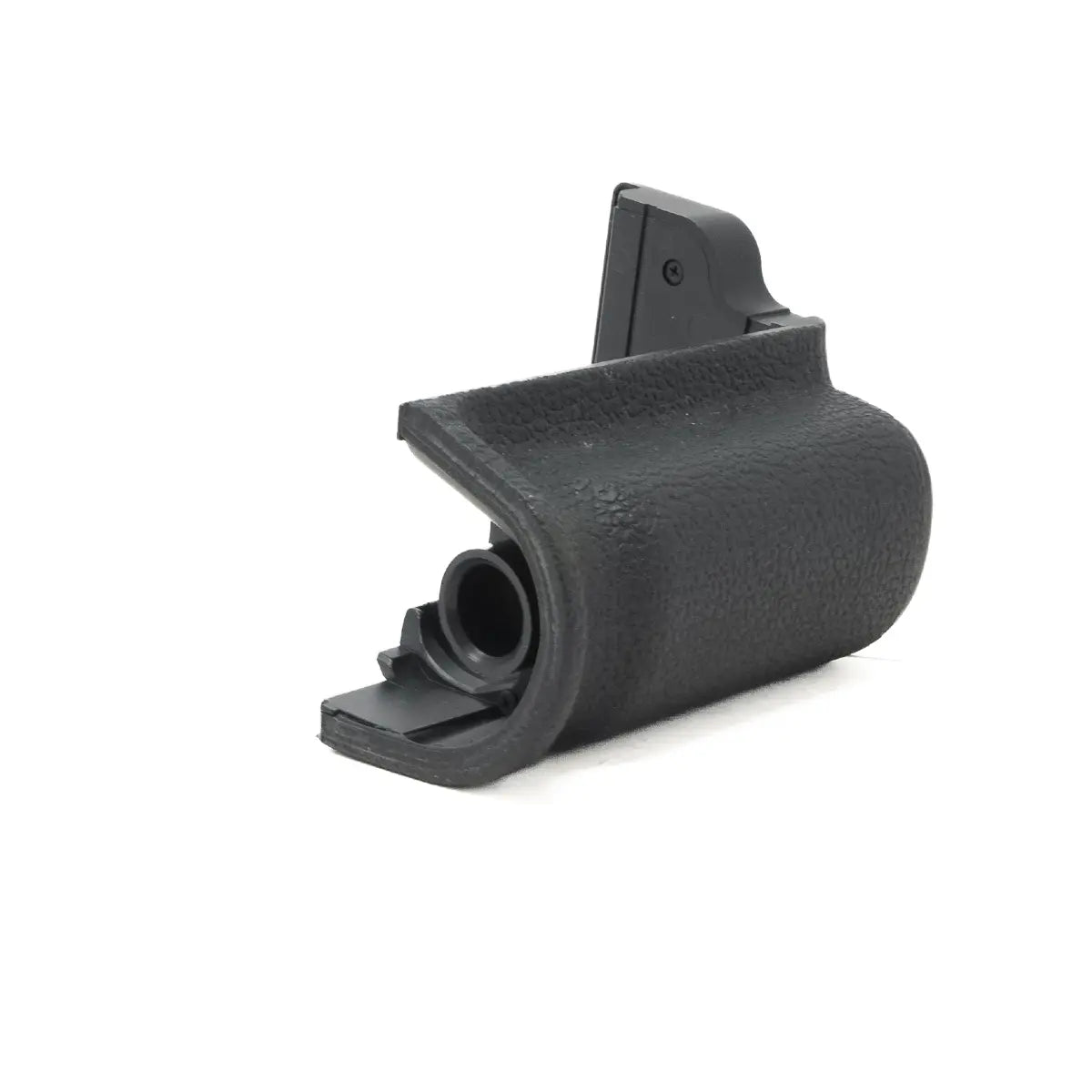 Black plastic component on a white background