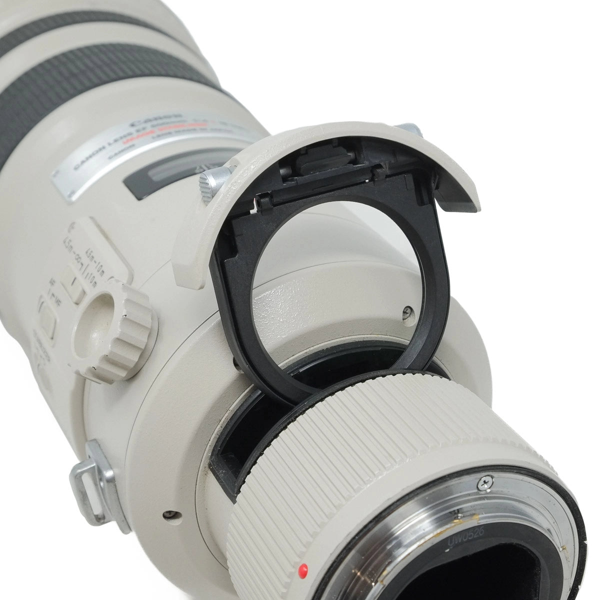 Close-up of a camera lens on a white background