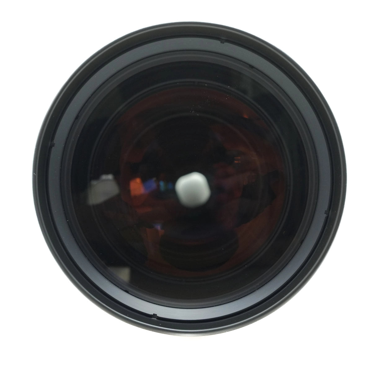 Close-up of a camera lens on a white background