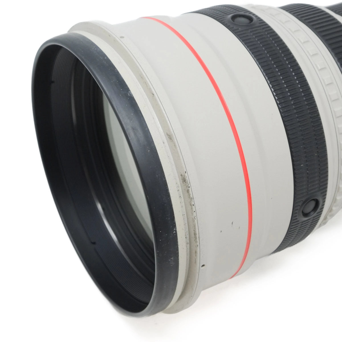 Close-up of a camera lens on a white background