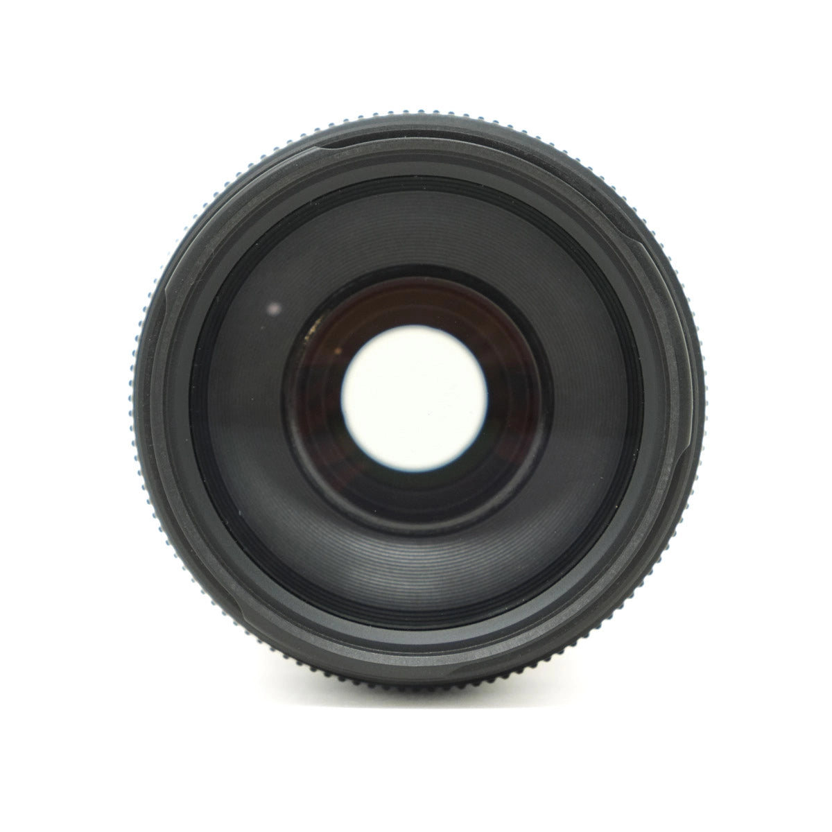 Black camera lens on a white background