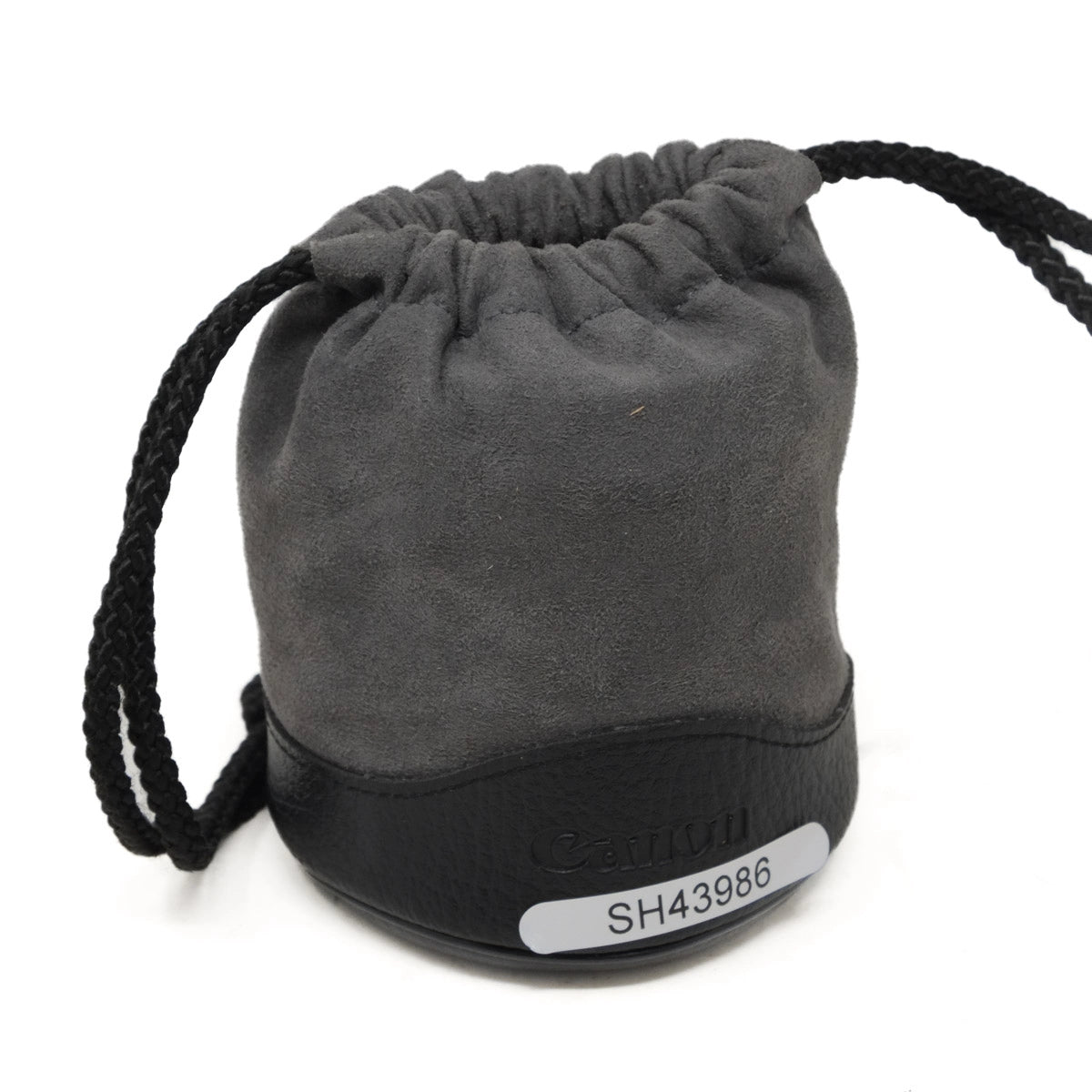 Gray drawstring bag with a Canon logo and model number on a white background