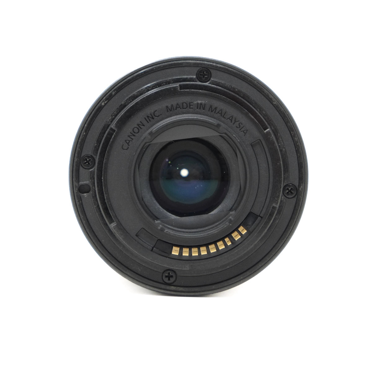 Camera lens with 'Canon Inc. Made in Malaysia' text on a white background