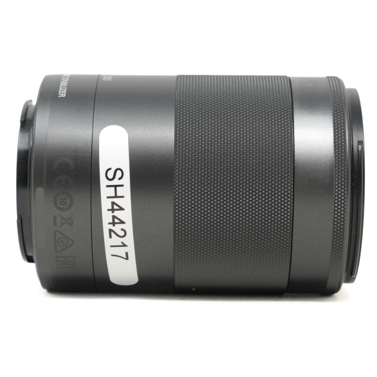 Grey camera lens on a white background