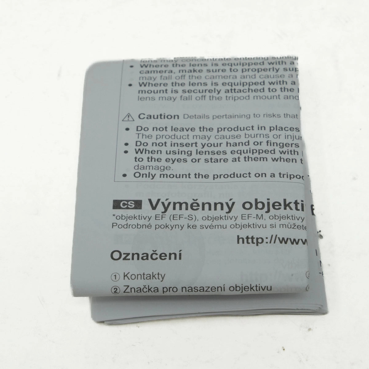 Folded paper with text on a white background