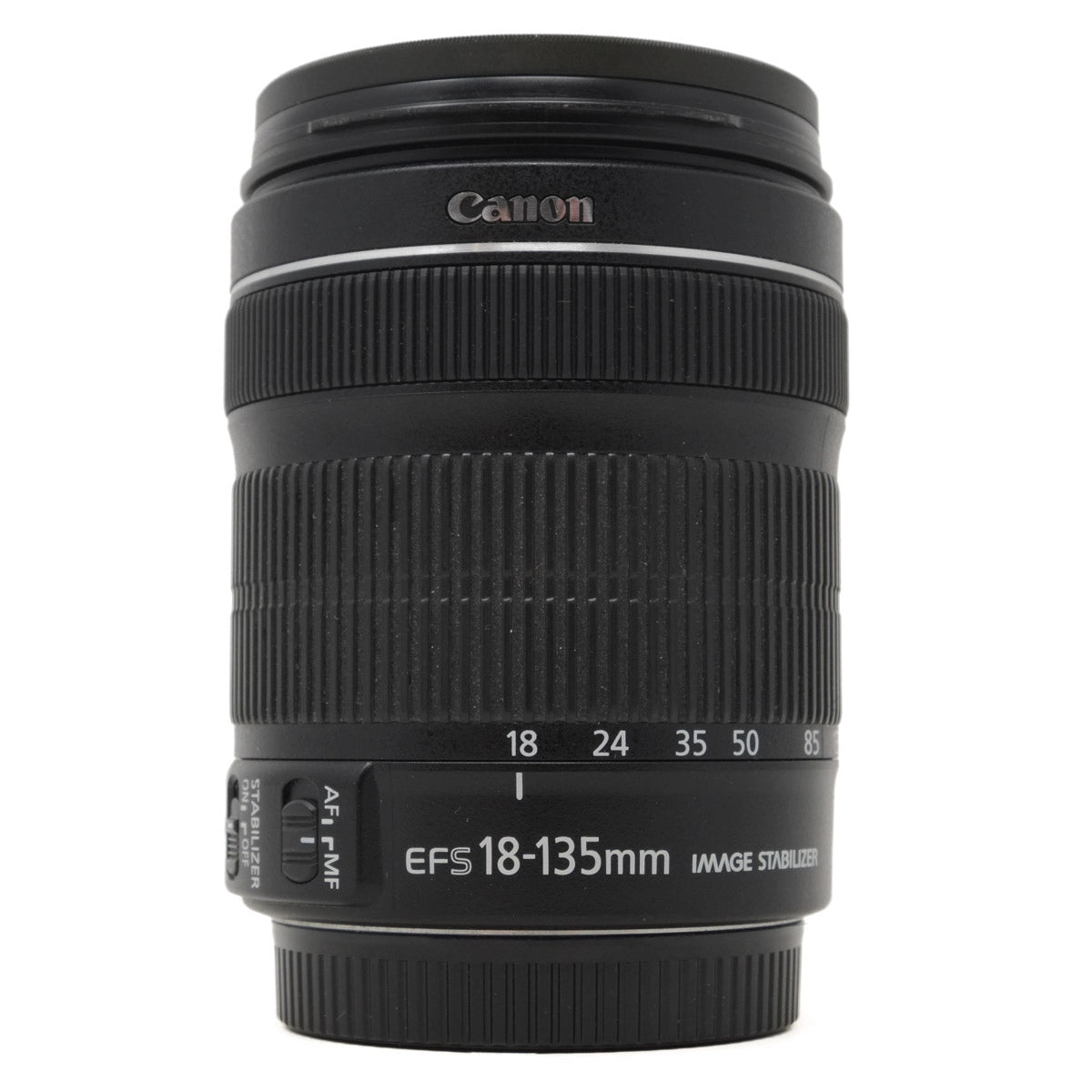 Canon camera lens with focus and aperture controls on a white background
