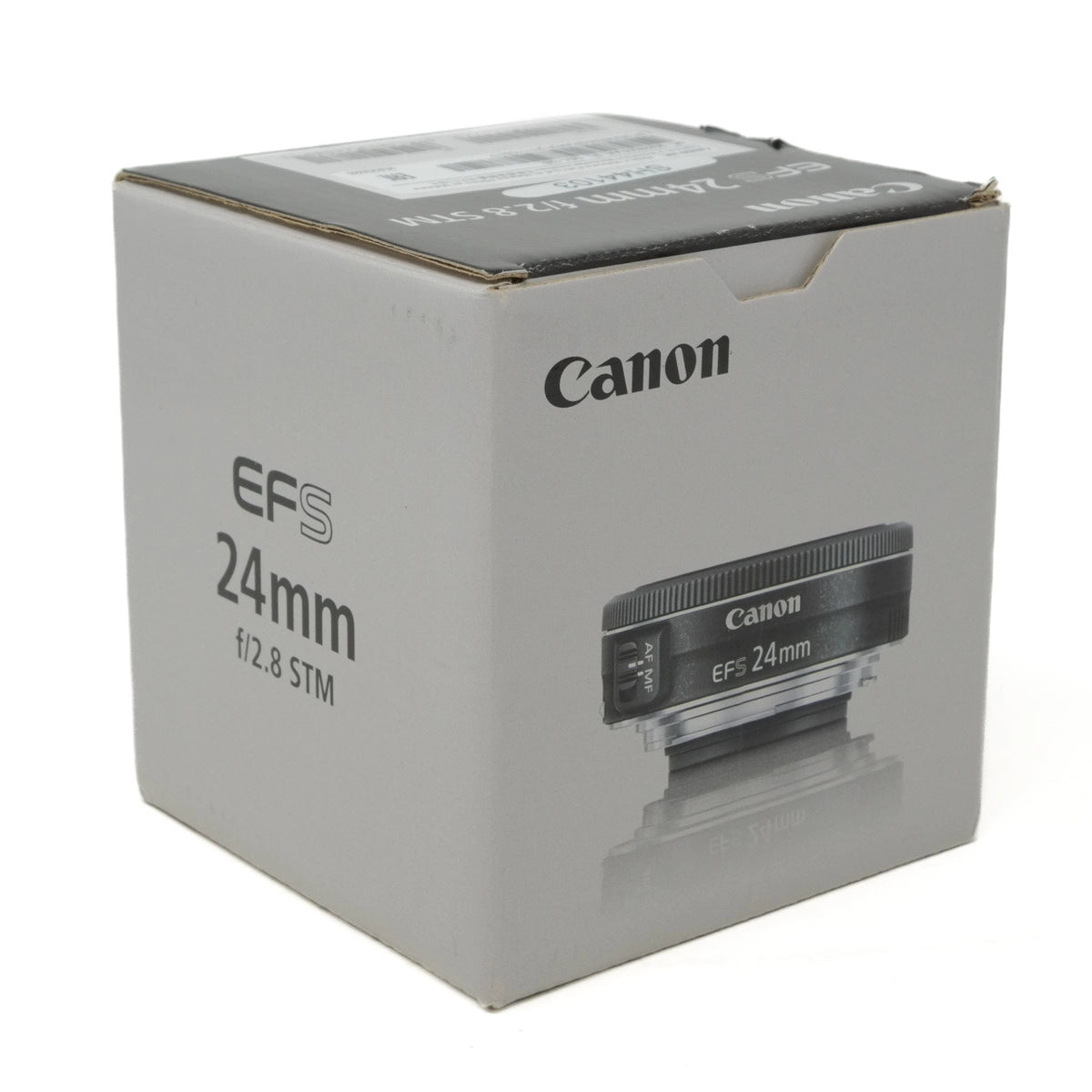 Canon EFS 24mm f/2.8 STM camera lens packaging on a white background