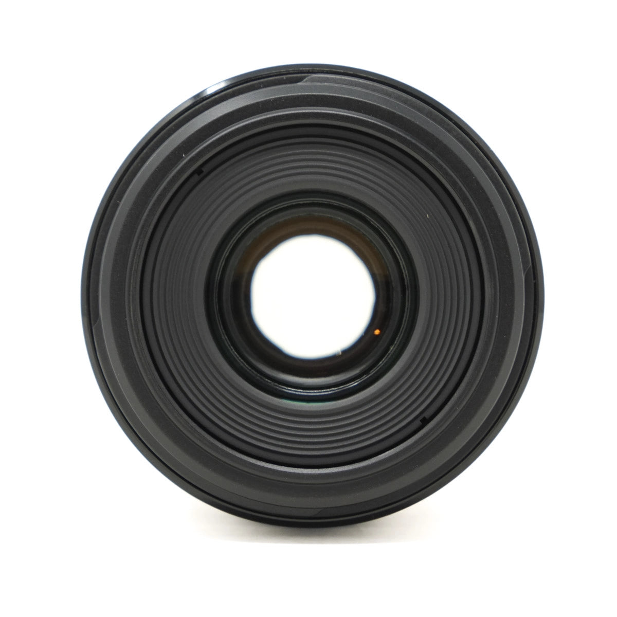 Black camera lens on a white background