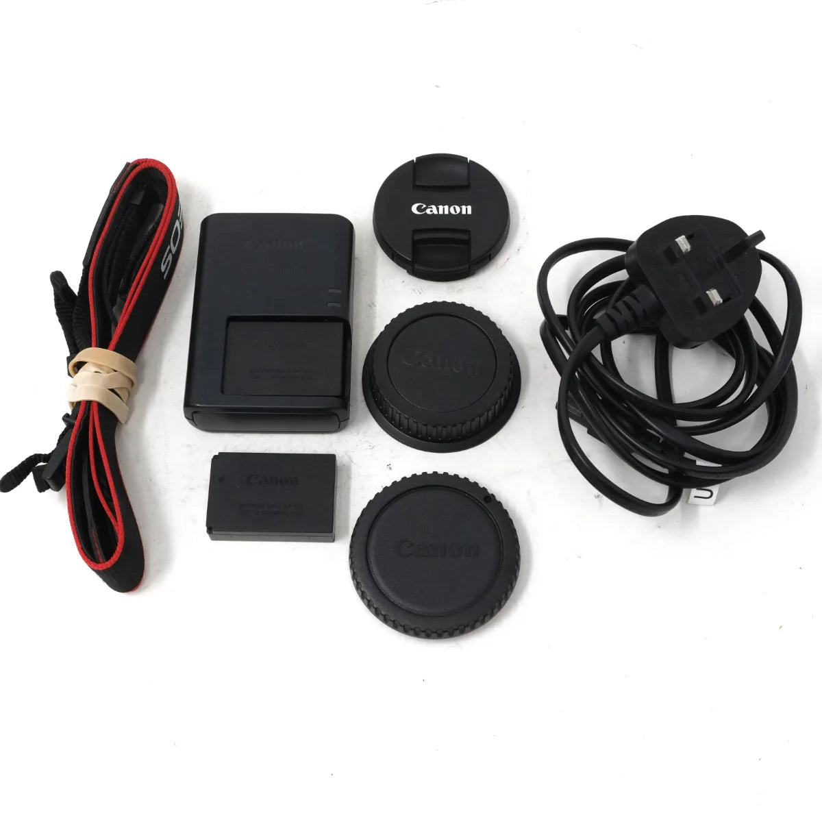 Used Canon EOS 100D + 18-55mm IS - strap, batteries, charger, caps and main lead