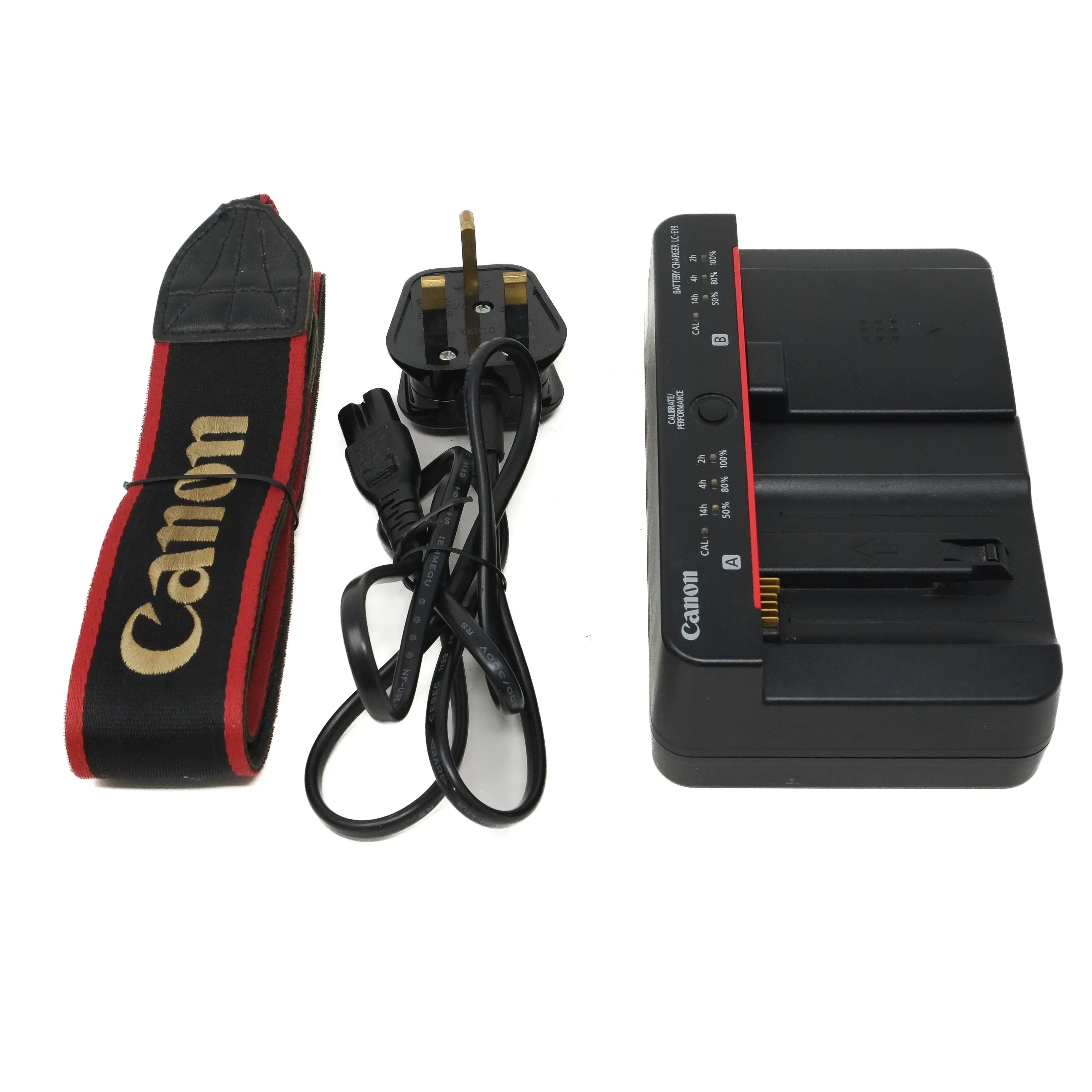 Canon camera battery charger and cable on a white background