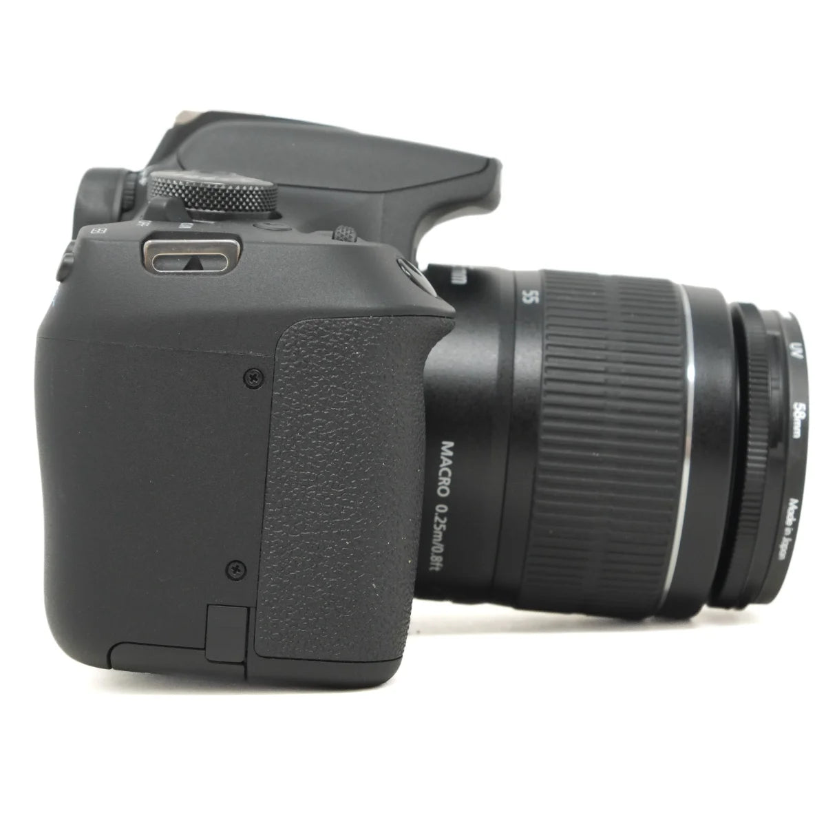 A black DSLR camera body with a zoom lens attached, photographed from the side against a plain white background.
