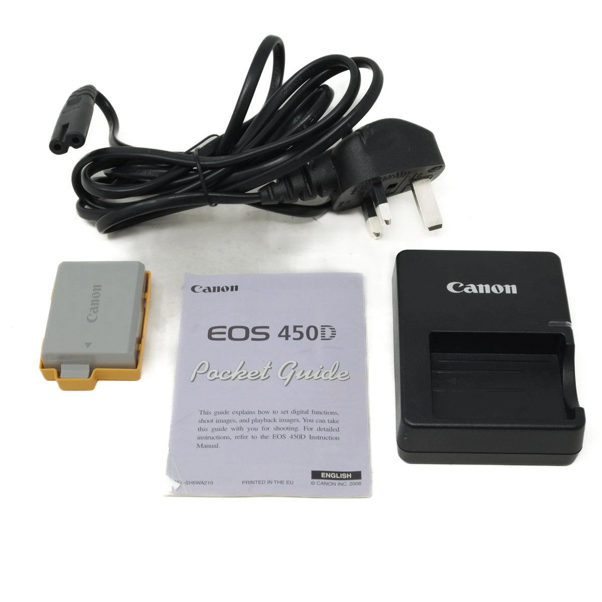 Canon camera accessories including a battery, charger, and pocket guide on a white background