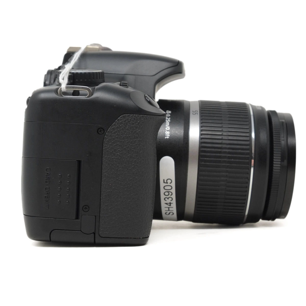 Black DSLR camera with lens on a white background