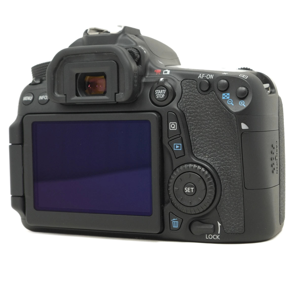 Back view of a black DSLR camera on a white background