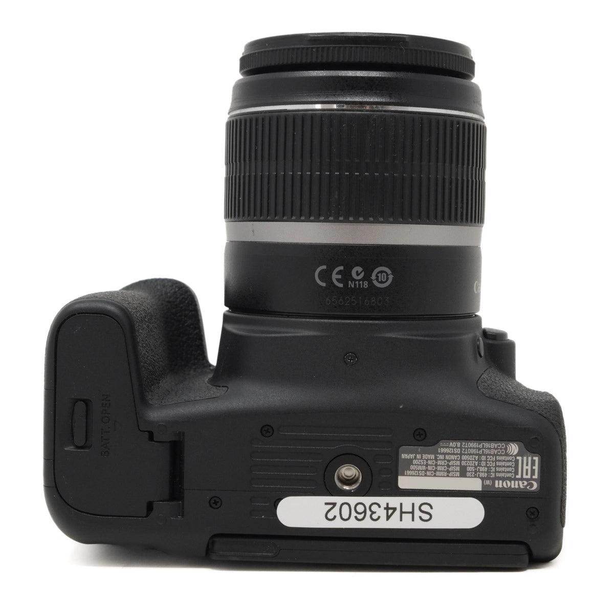 Bottom view of a black camera with lens and branding on a white background