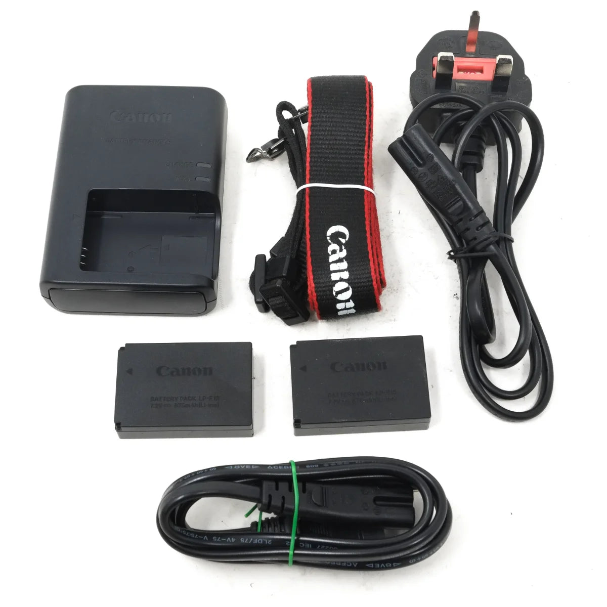 Used Canon EOS M Mirrorless camera - charger, batteries and strap