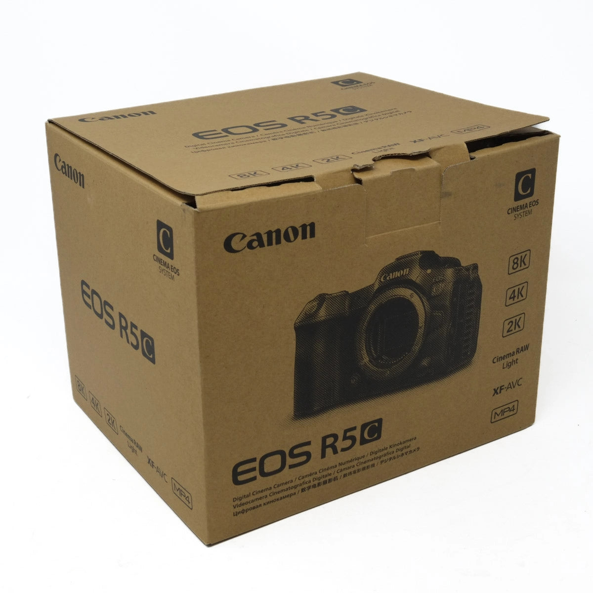 Cardboard box packaging for Canon EOS R5 camera on a white background