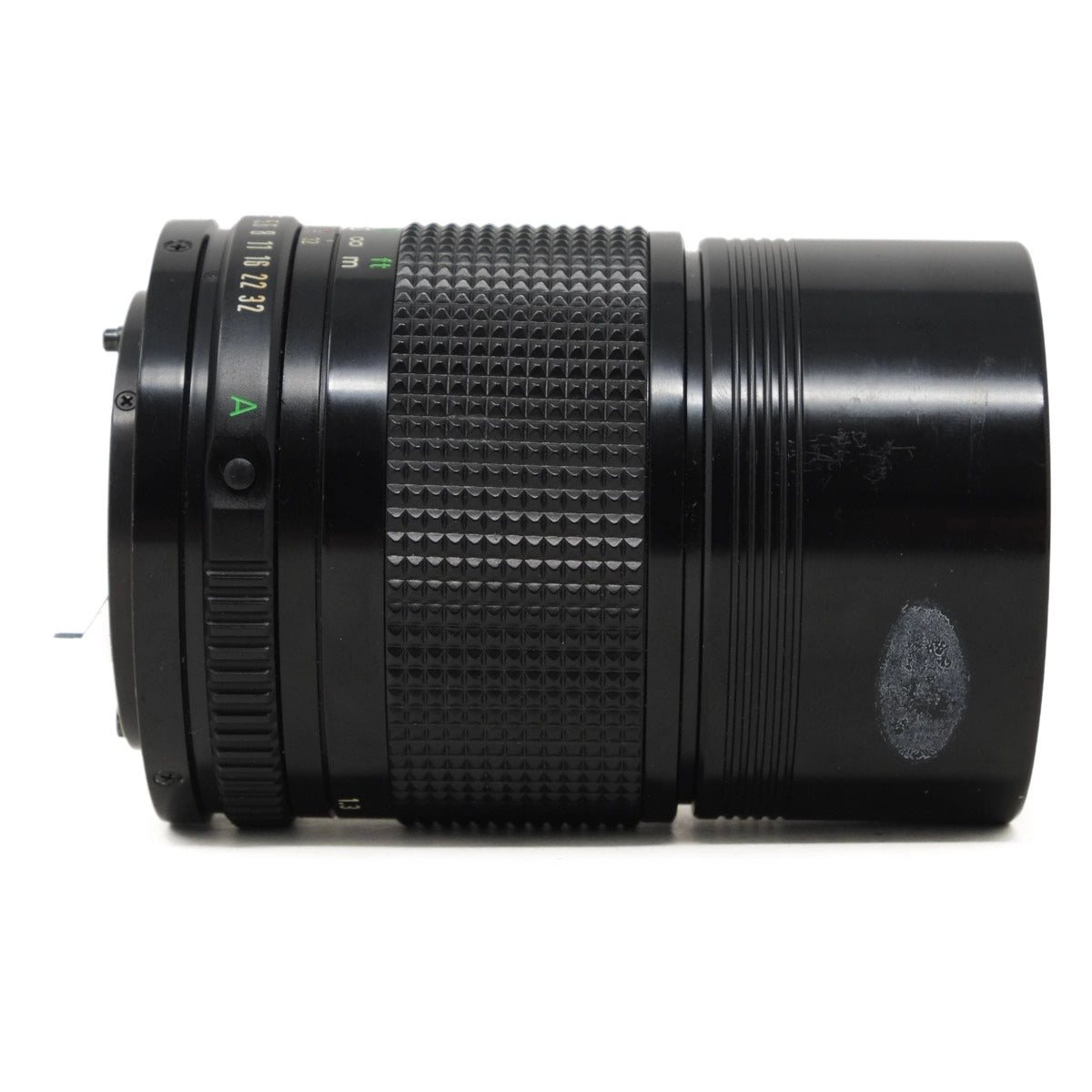 Black camera lens on a white background