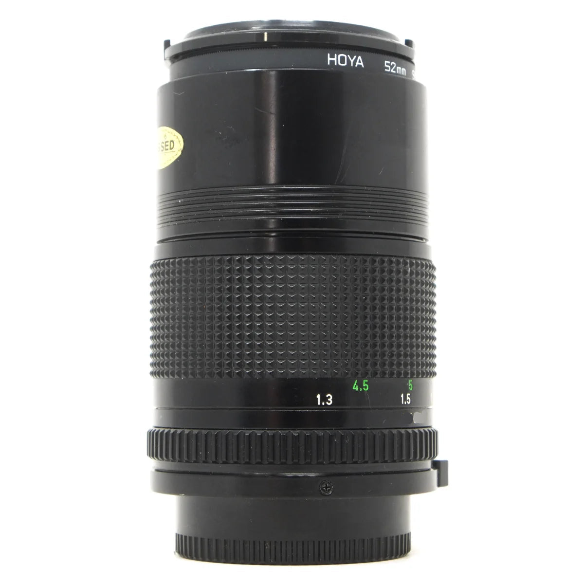 Used Canon FD 135mm F3.5 film camera lens - side angle