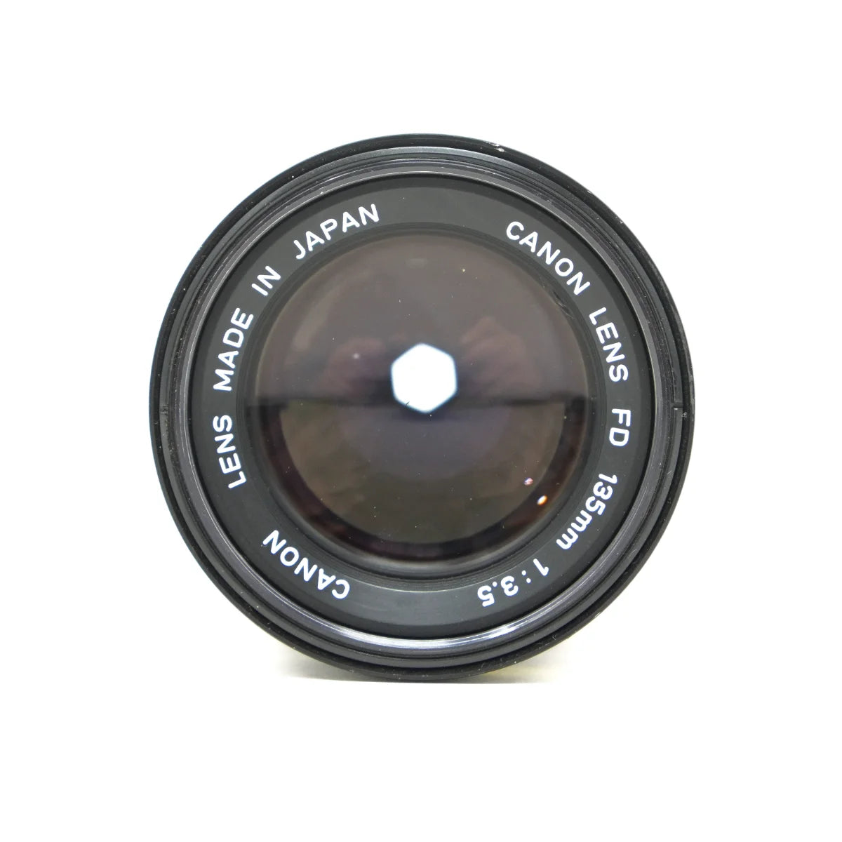 Used Canon FD 135mm F3.5 film camera lens - top angle