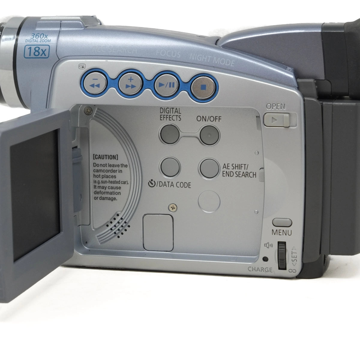 Close-up of a digital camera with open LCD screen on a white background