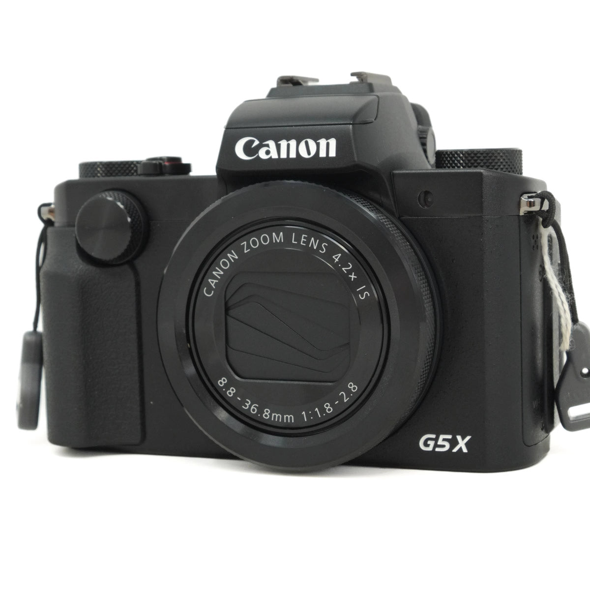 Canon G5X camera on a white background