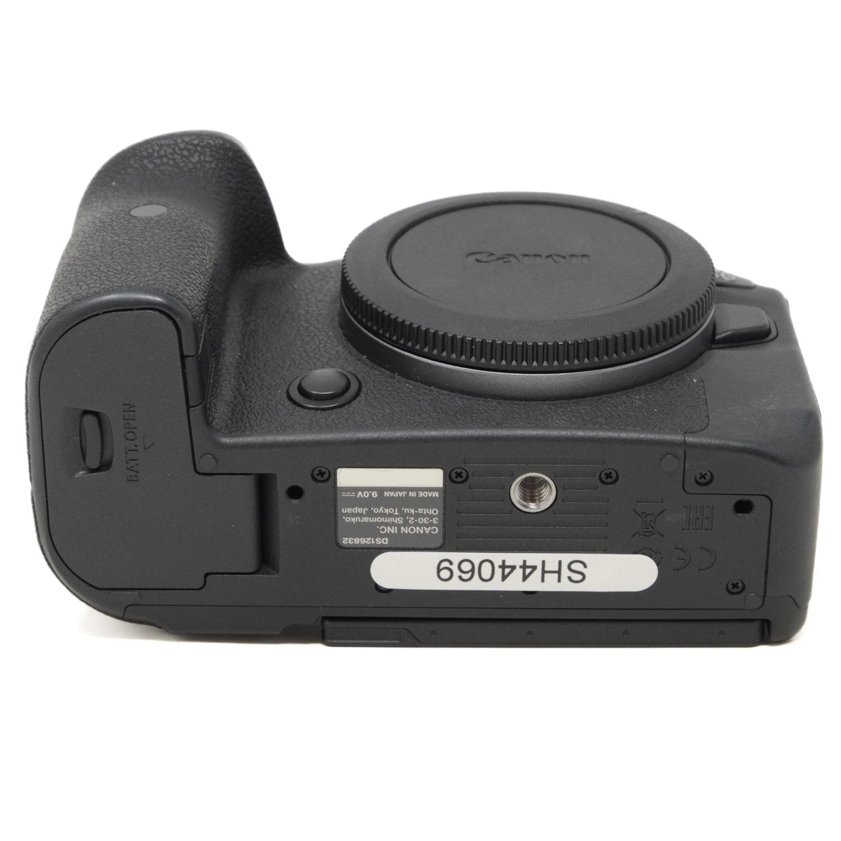 Camera body with cap on a white background