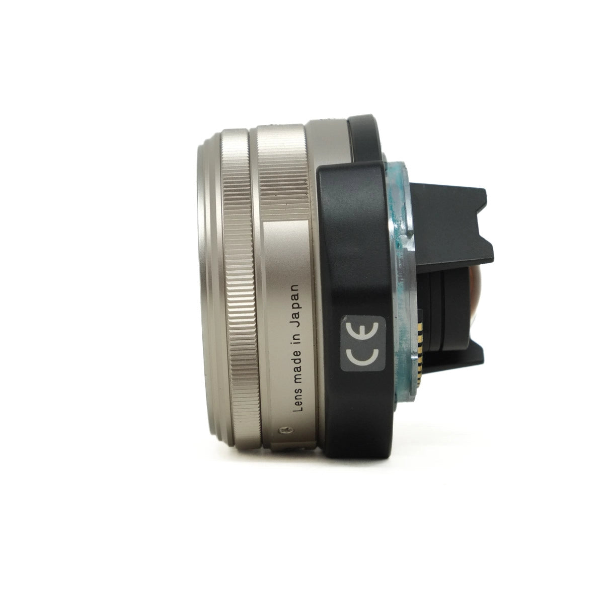 Camera lens with 'Made in Japan' text on a white background