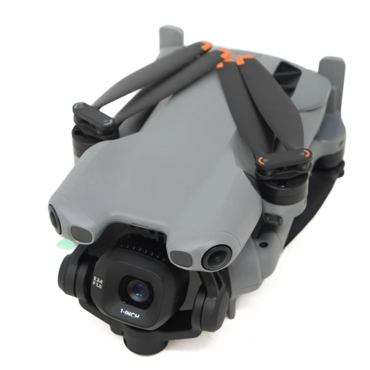 Gray and black drone with camera on a white background