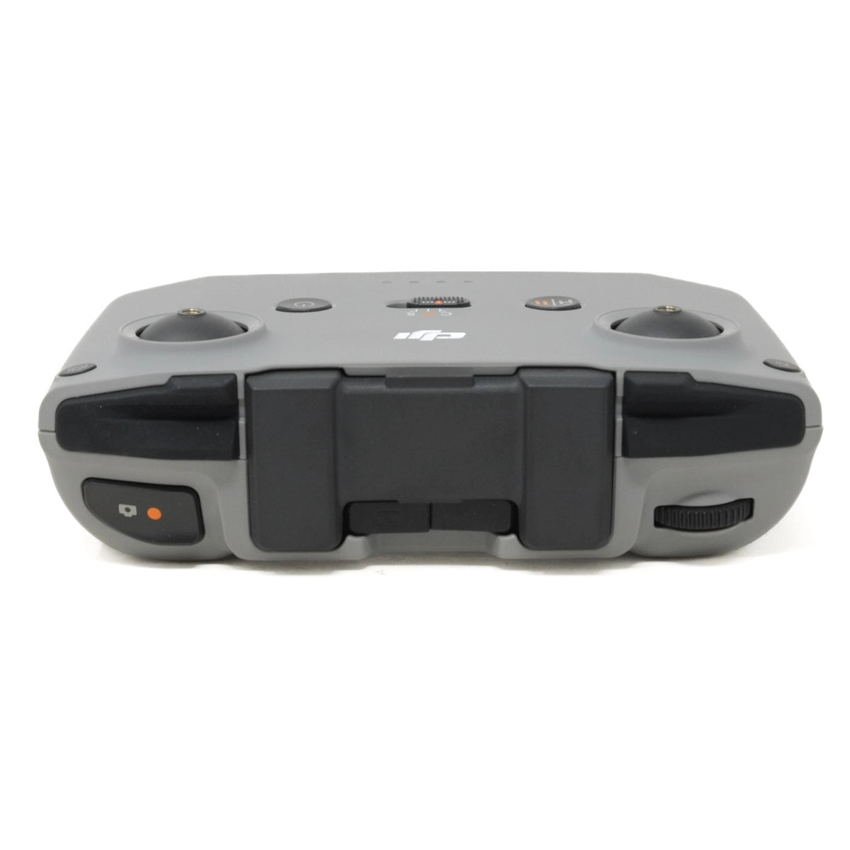 Gray and black remote control with DJI logo on a white background