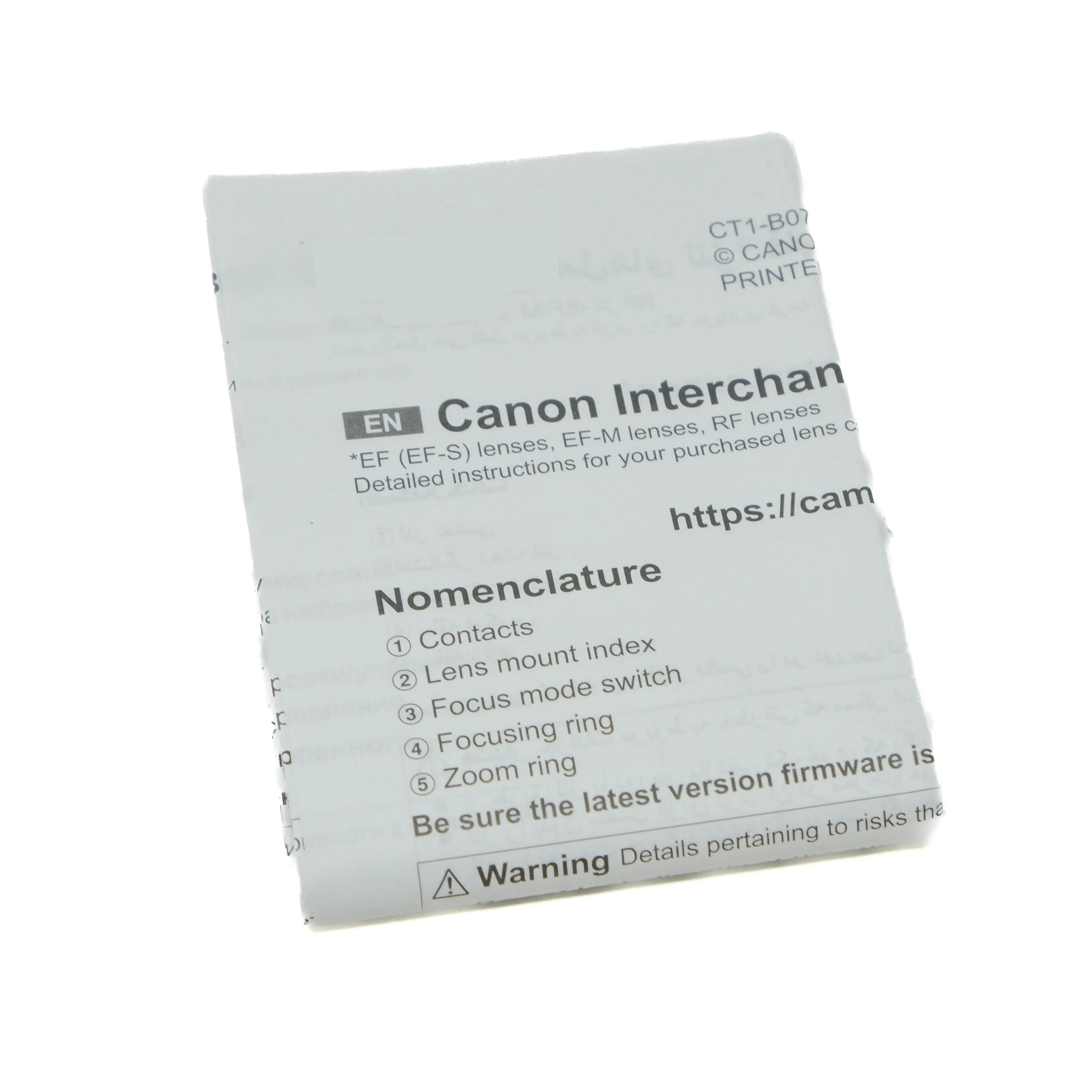 Canon interchangeable lens manual on a white background