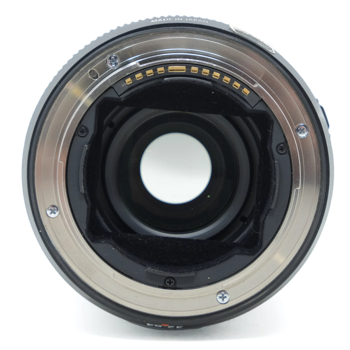 Close-up of a camera lens on a white background