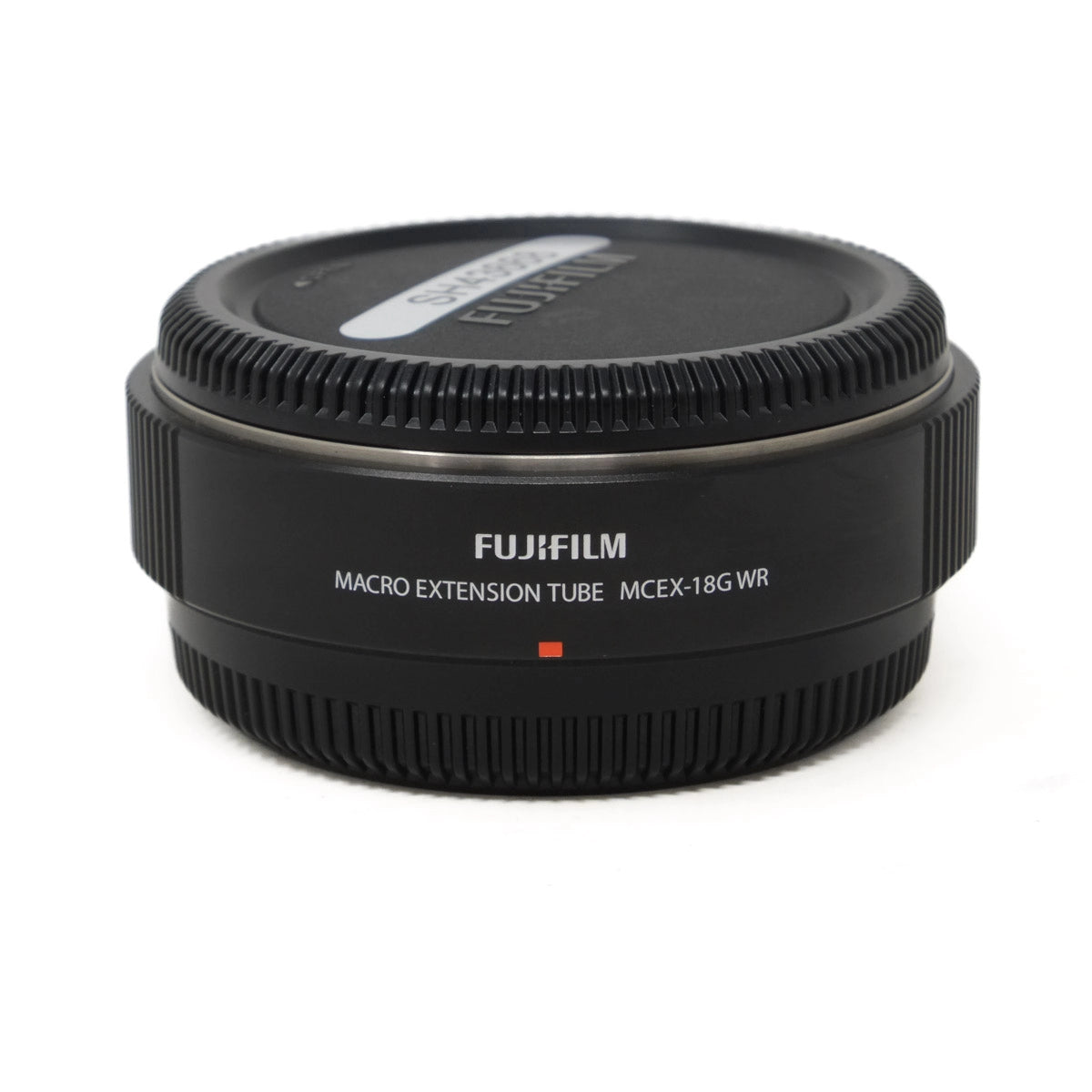 Fujifilm macro extension tube on a white background