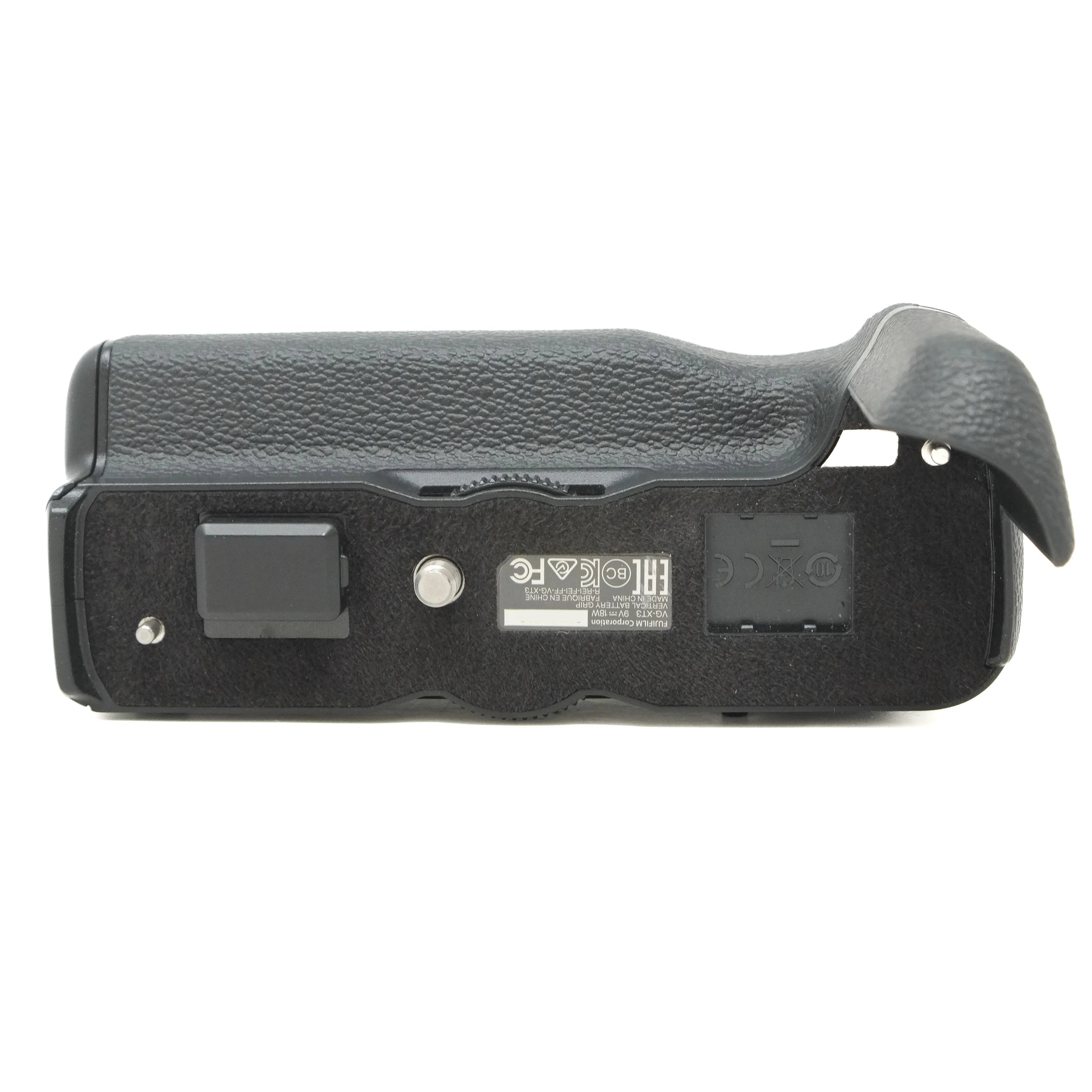 Black camera battery grip on a white background