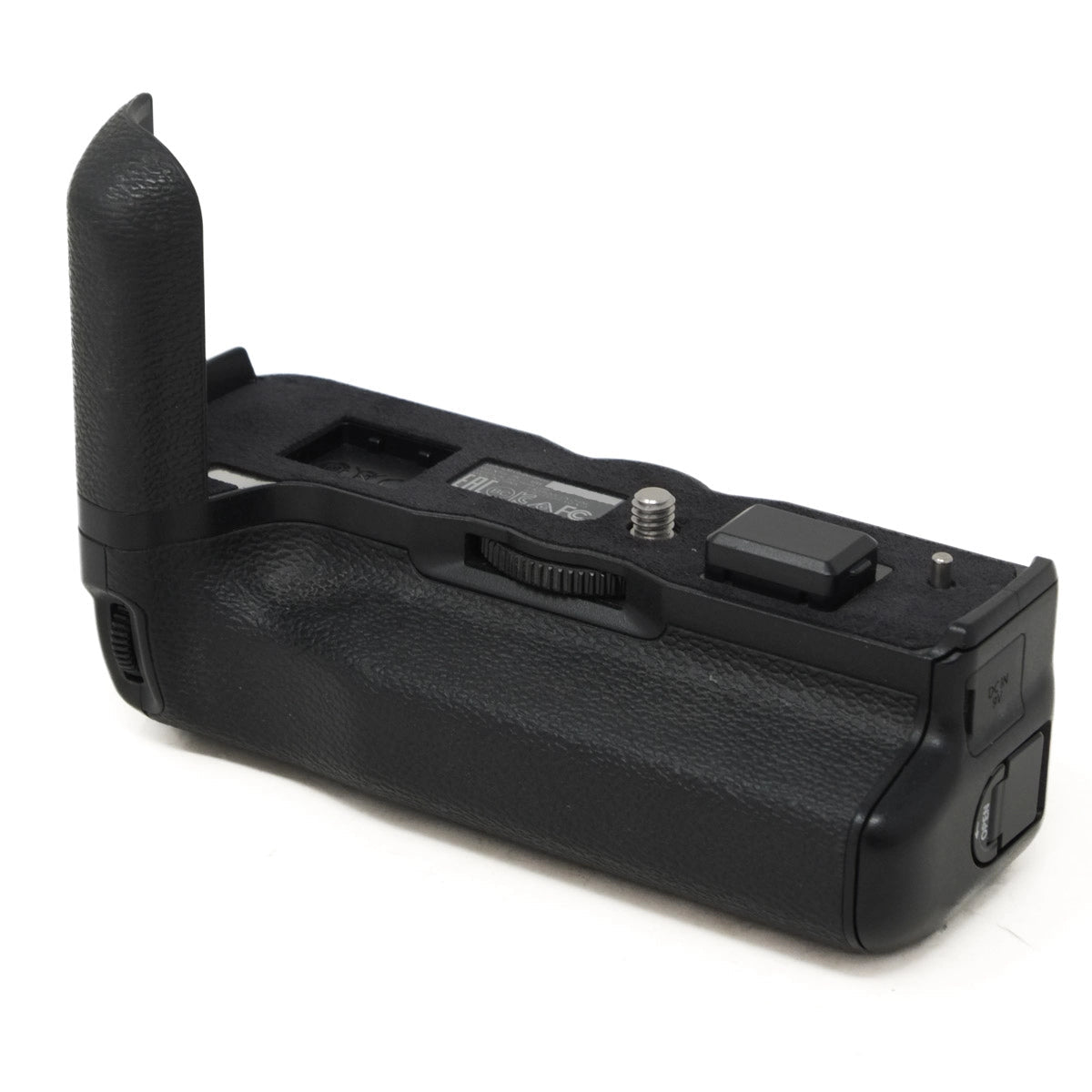 Black camera battery grip on a white background