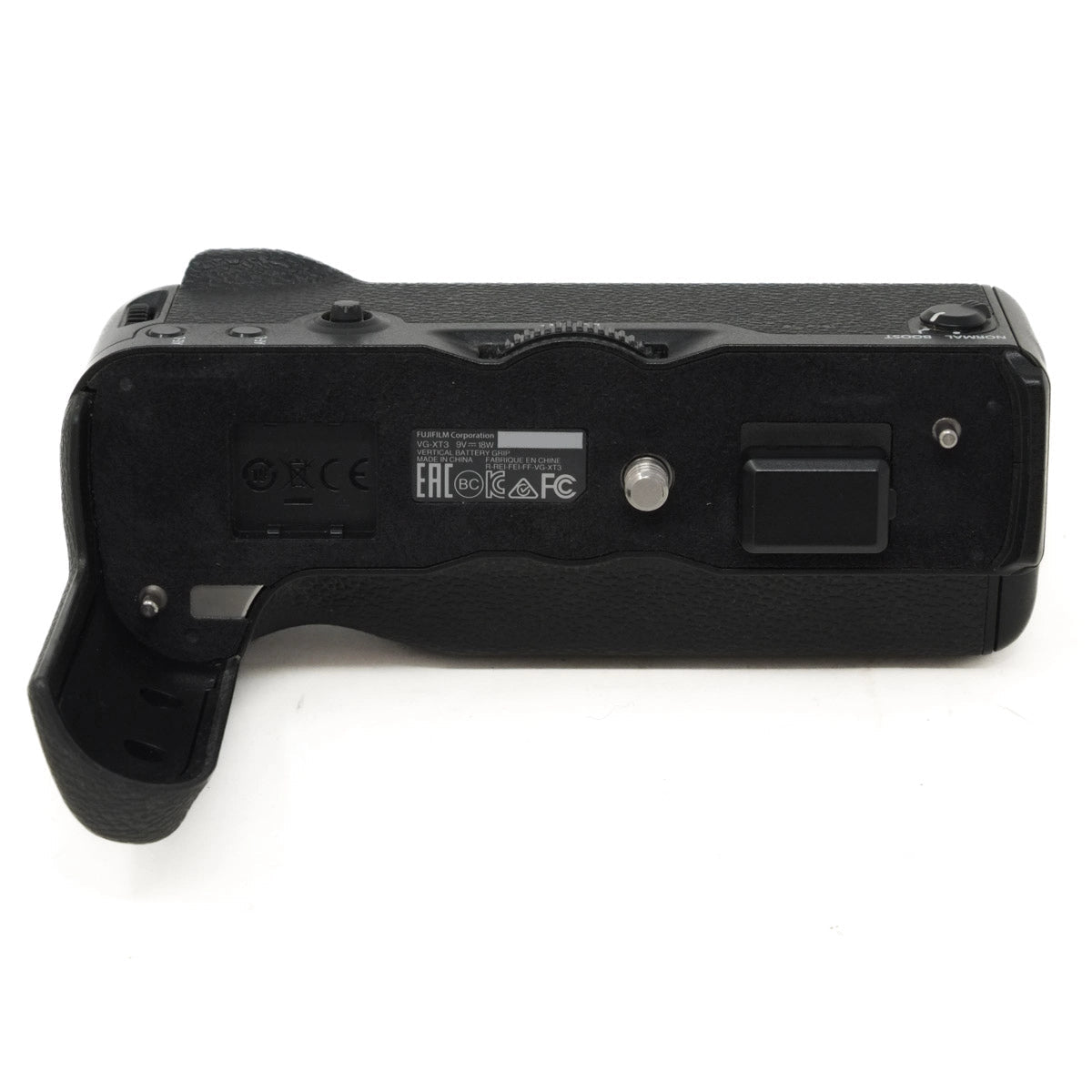 Black camera battery grip on a white background