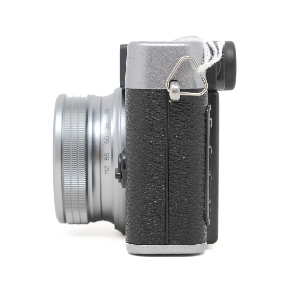 Camera with textured grip on a white background