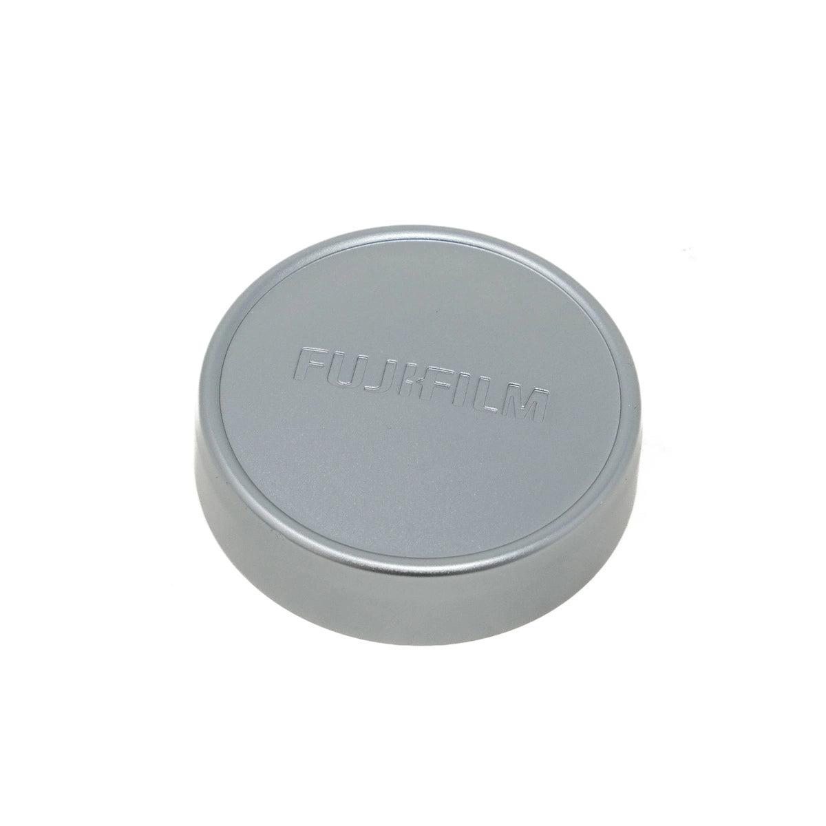 Gray lens cap with 'FUJIFILM' branding on a white background