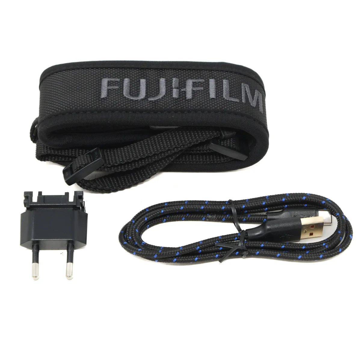 Black Fujifilm camera strap with a built-in USB charging cable and a two-pin power adapter, shown on a plain white background.